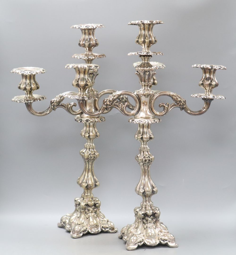 A pair of Continental two branch plated candelabra, height 53cm